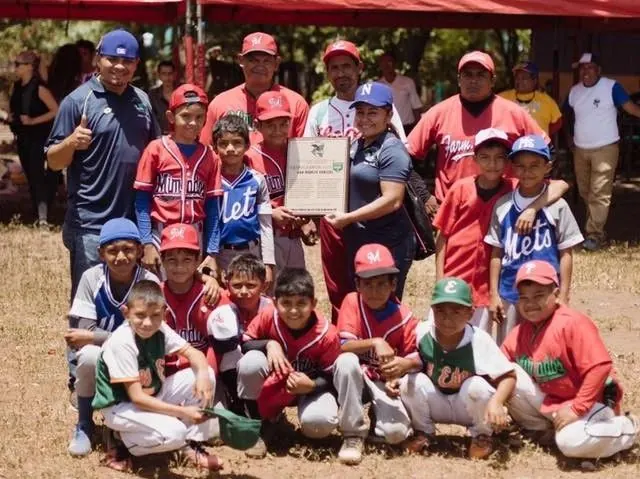 Young people participating in a baseball ministry program