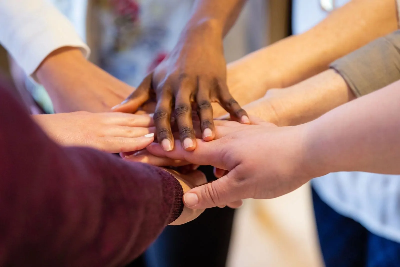 Hands joined together in prayer and partnership